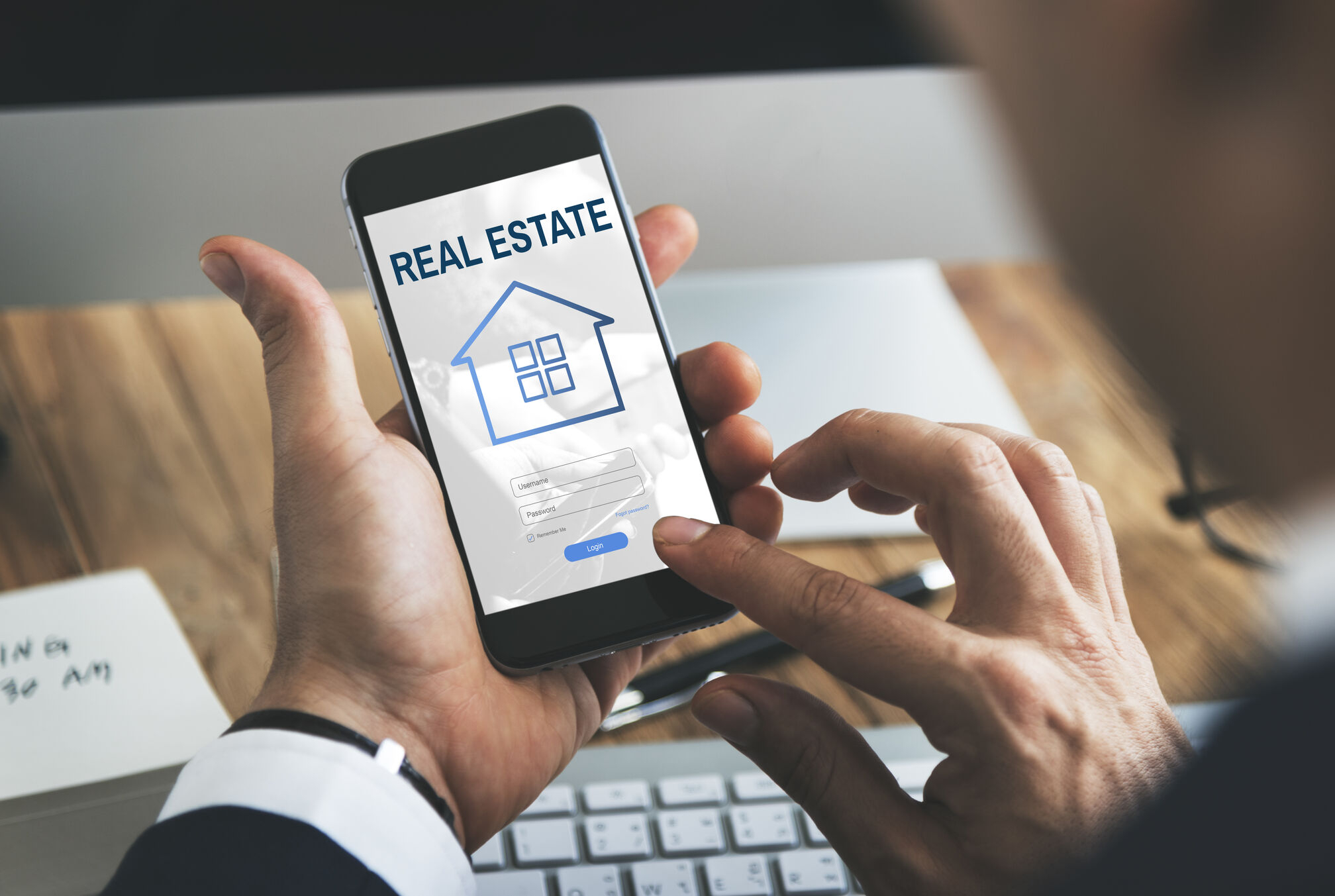 Agent creating marketing content using the best real estate apps for social media