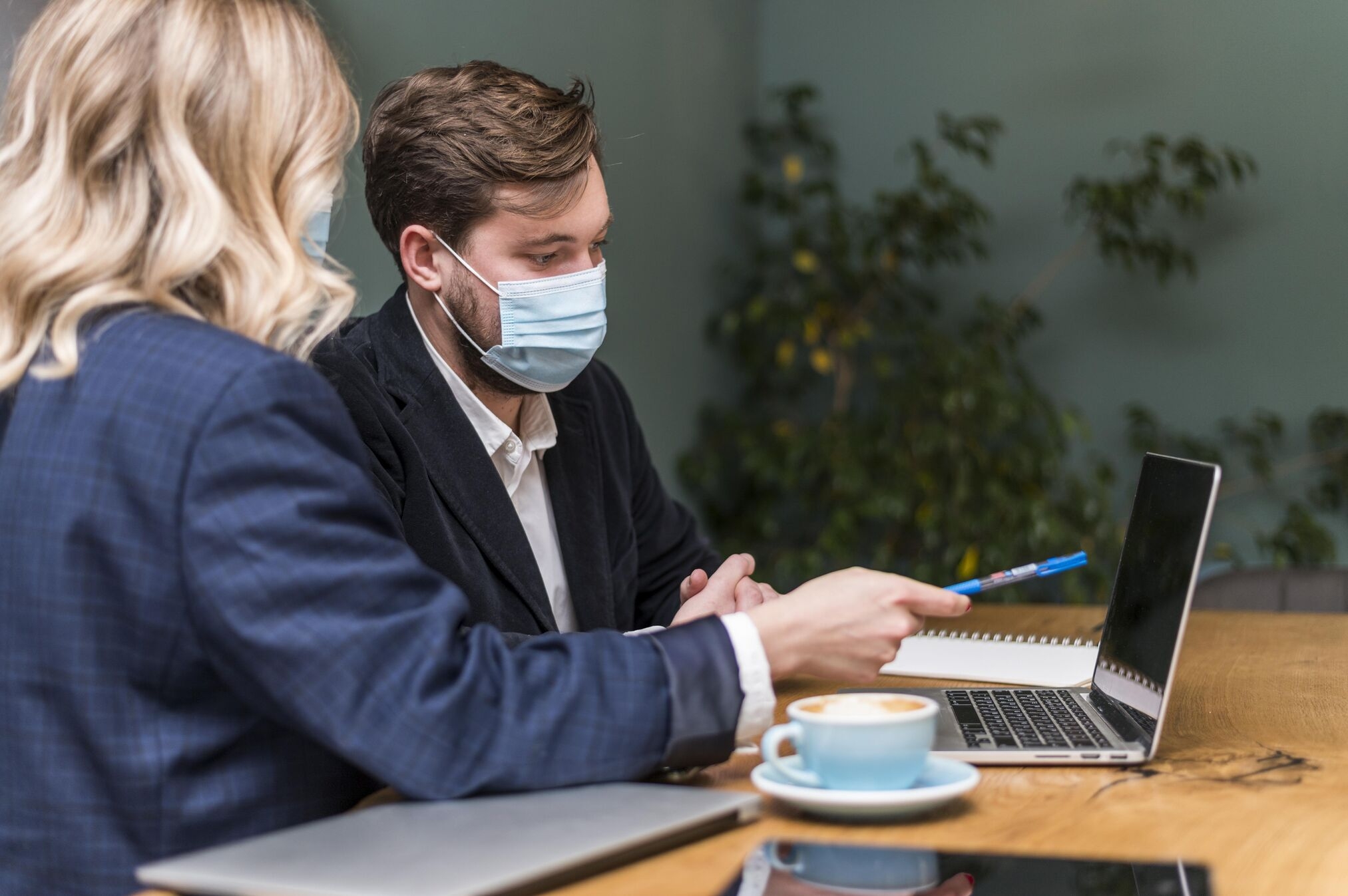 An aspiring insurance agent studying for a New York insurance exam at a desk, showing a career change into insurance