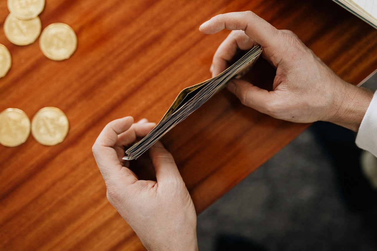 Counting money.